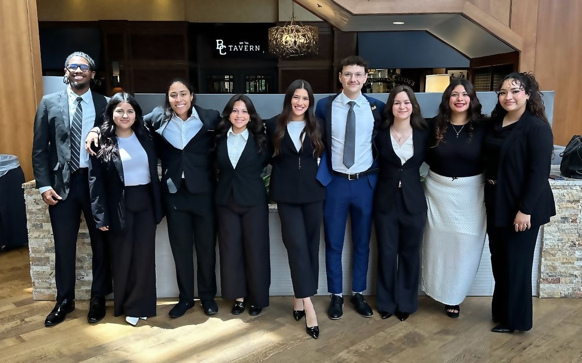 The Social Standard team gathered together in a hotel lobby